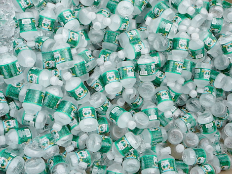 A pile of half-pint Poland Spring bottles, a brand manufactured by a Nestlé subsidiary. (Image Credit: Brett Weinstein)